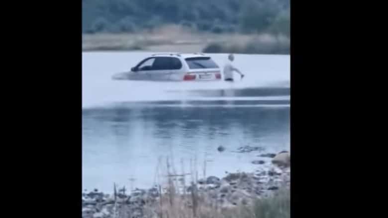 video un șofer a încercat să treacă prin râul bistriţa cu bmw-ul, dar a rămas blocat în apă