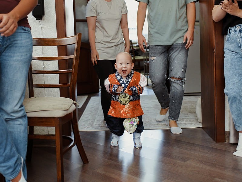 a baby wearing traditional clothes