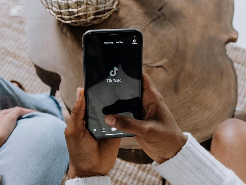 person holding black android smartphone